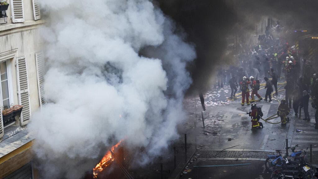 Live: A demonstrator died from 'cardiorespiratory arrest' during Paris protests, police say